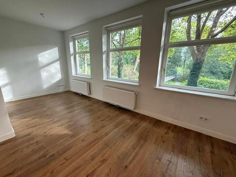 Licht 3-kamerappartement met balkon in De Baarsjes - Afbeelding 2