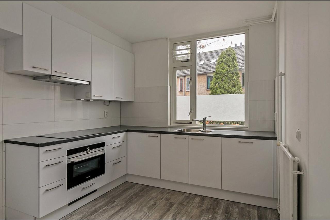 Eengezinswoning met 4 slaapkamers en tuin - Afbeelding 5