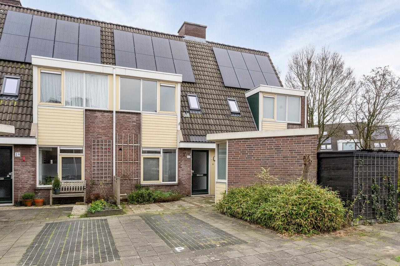 Eengezinswoning van 109 m² met tuin - Afbeelding 2