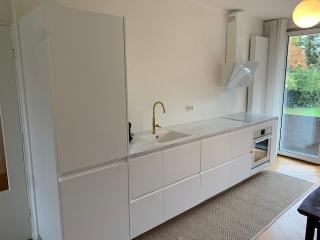 Furnished 2-Bedroom Apartment with Garden - Image 8