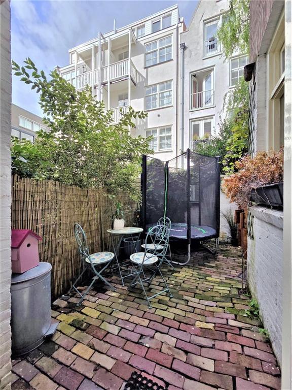 Gemeubileerd herenhuis met tuin in de Jordaan - Afbeelding 19