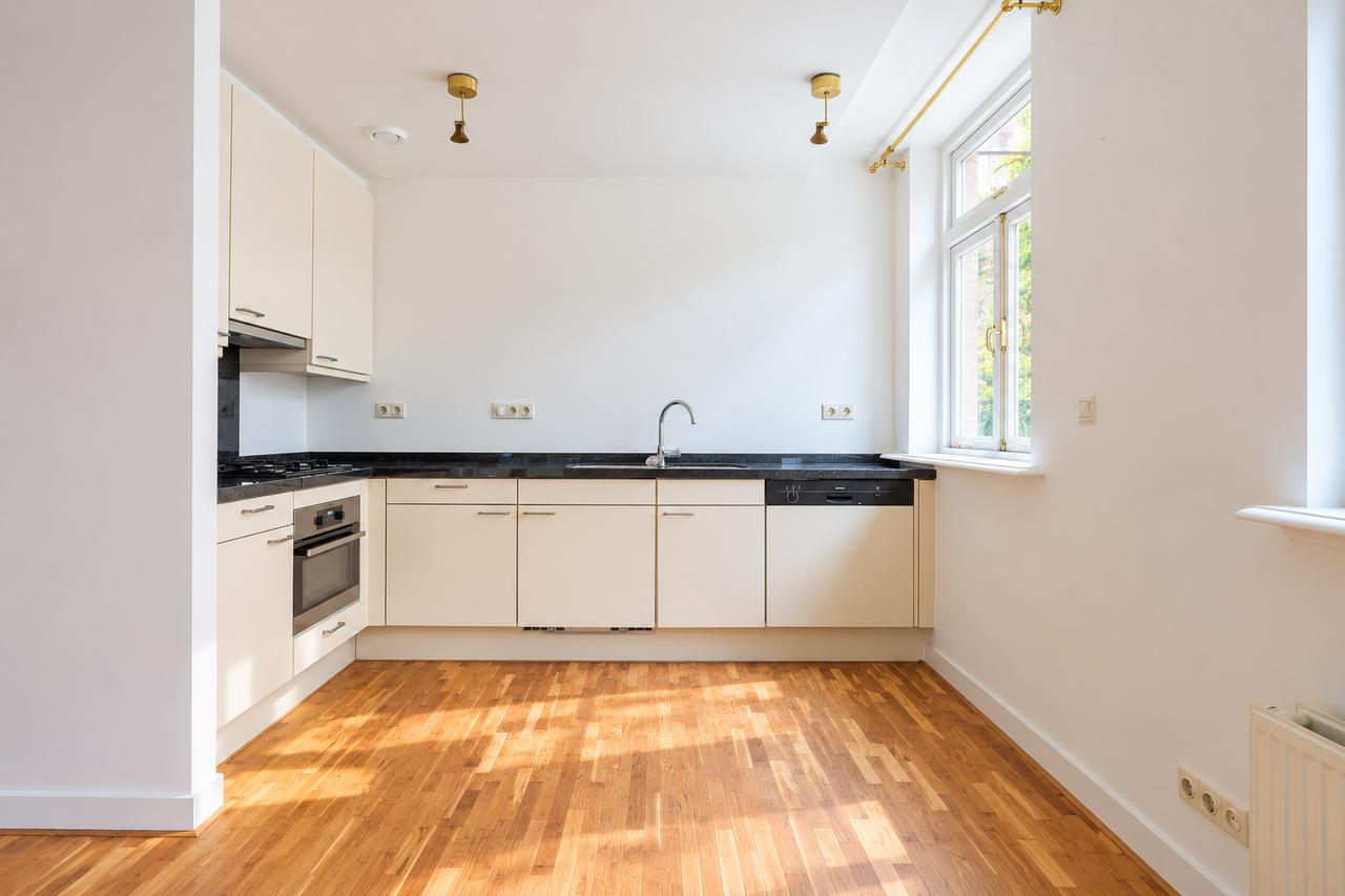 Ongemeubileerd appartement met tuin - Afbeelding 3