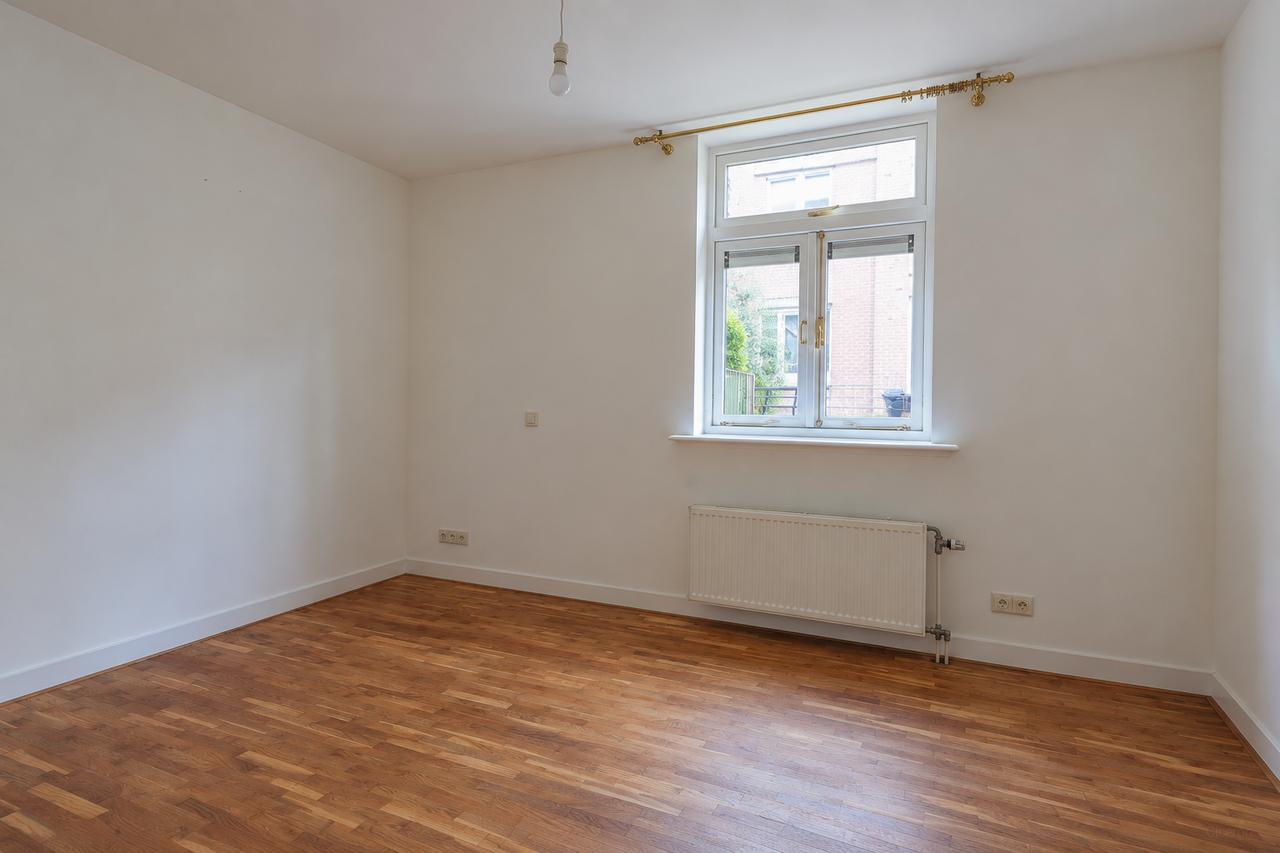 Ongemeubileerd appartement met tuin - Afbeelding 10