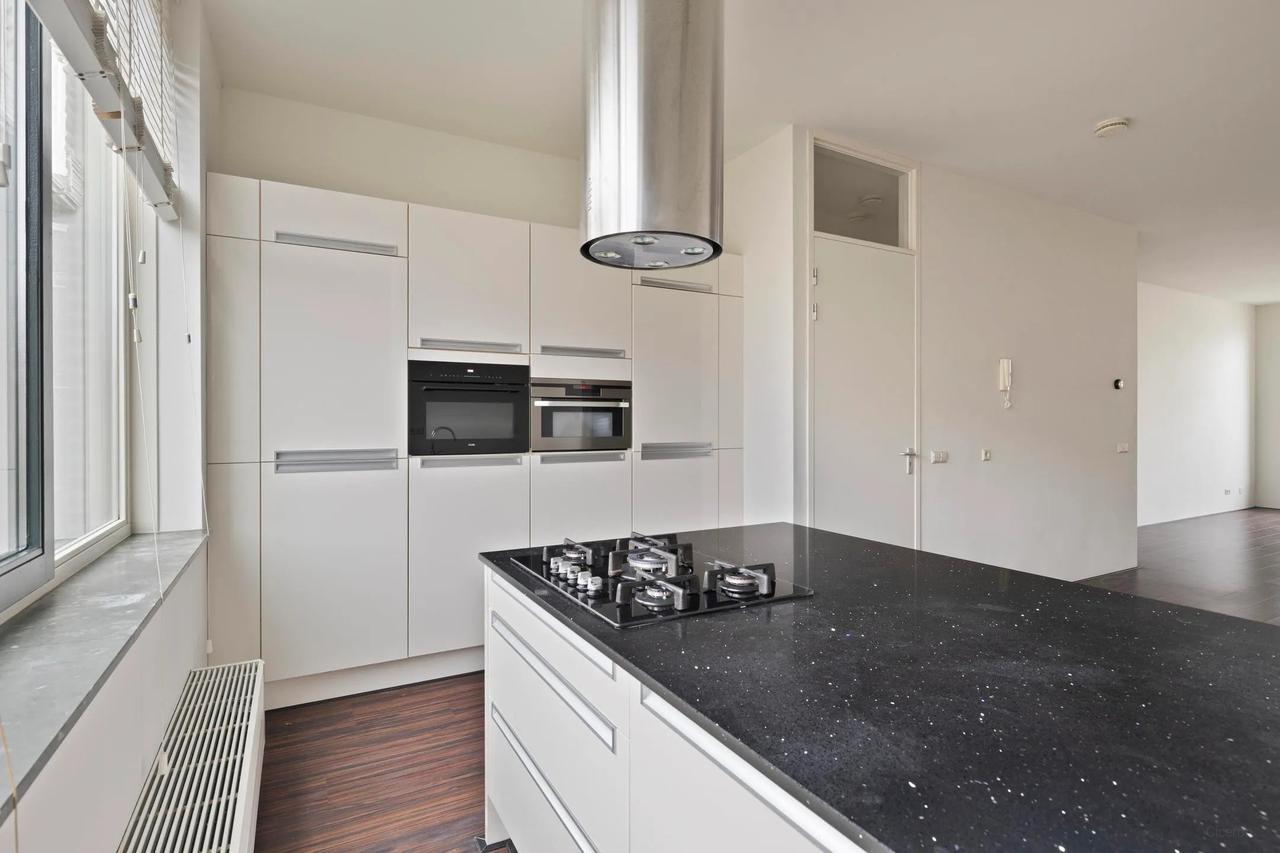 141 m² bovenwoning met zonnig dakterras - Afbeelding 8
