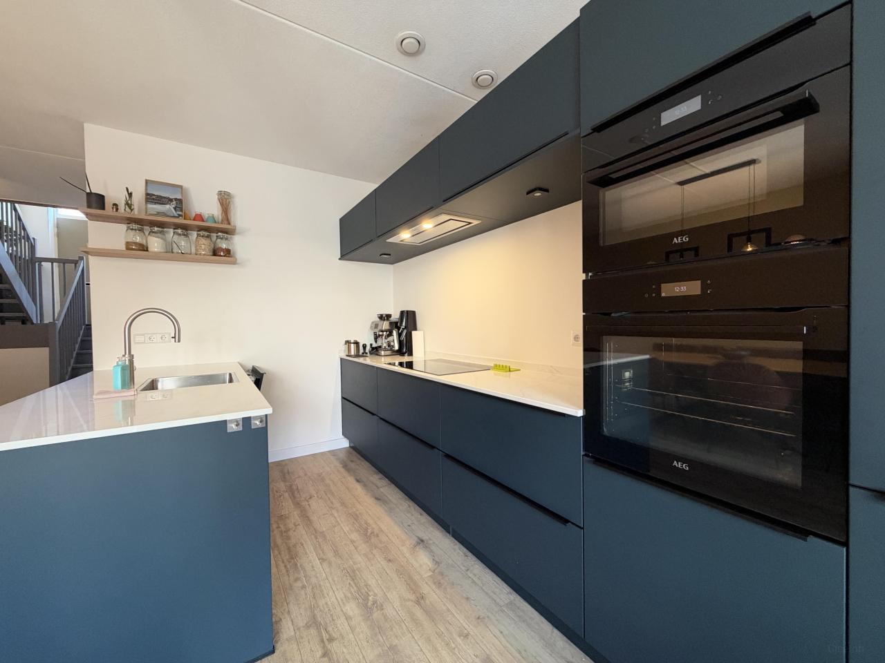 Gemeubileerde benedenwoning met tuin in Spangen - Afbeelding 5