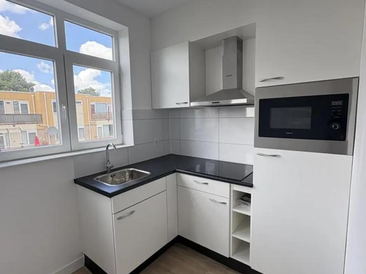 106 m² met balkon, dakterras en label A - Afbeelding 1