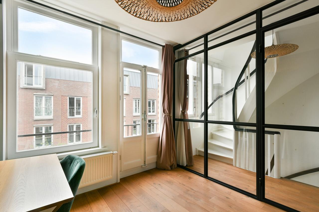 Gemeubileerd dubbel bovenhuis met dakterras - Afbeelding 11