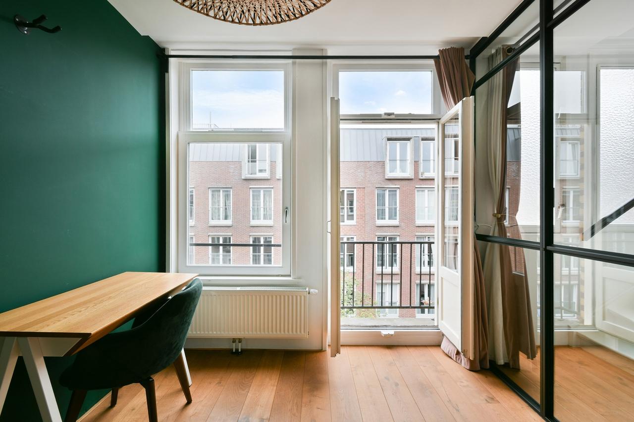 Gemeubileerd dubbel bovenhuis met dakterras - Afbeelding 12
