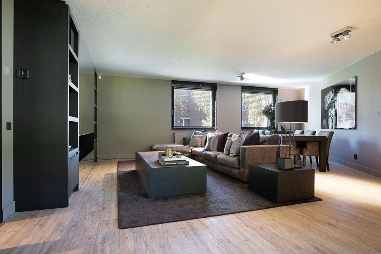 Gemeubileerde benedenwoning met tuin - Afbeelding 1