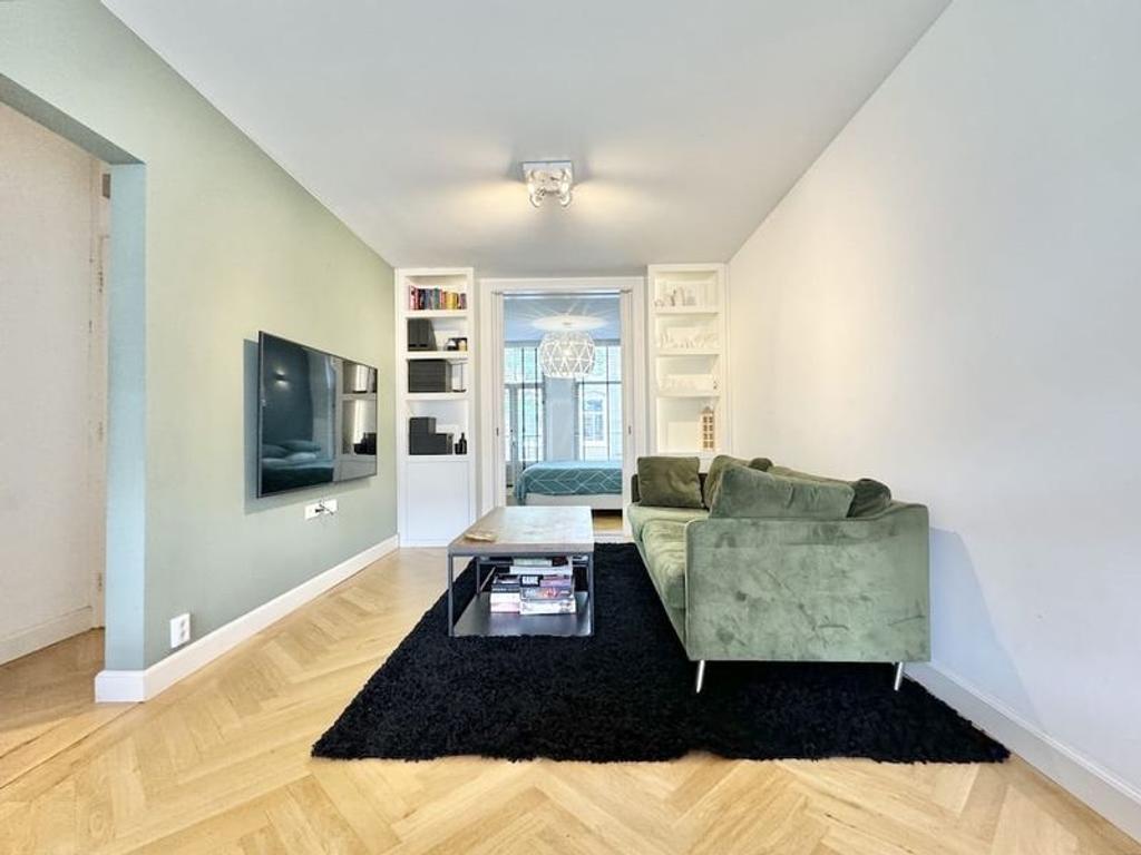 Furnished 1-Bedroom Apartment with Balcony - Image 1