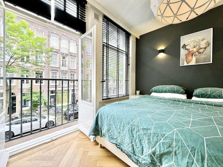 Furnished 1-Bedroom Apartment with Balcony - Image 7