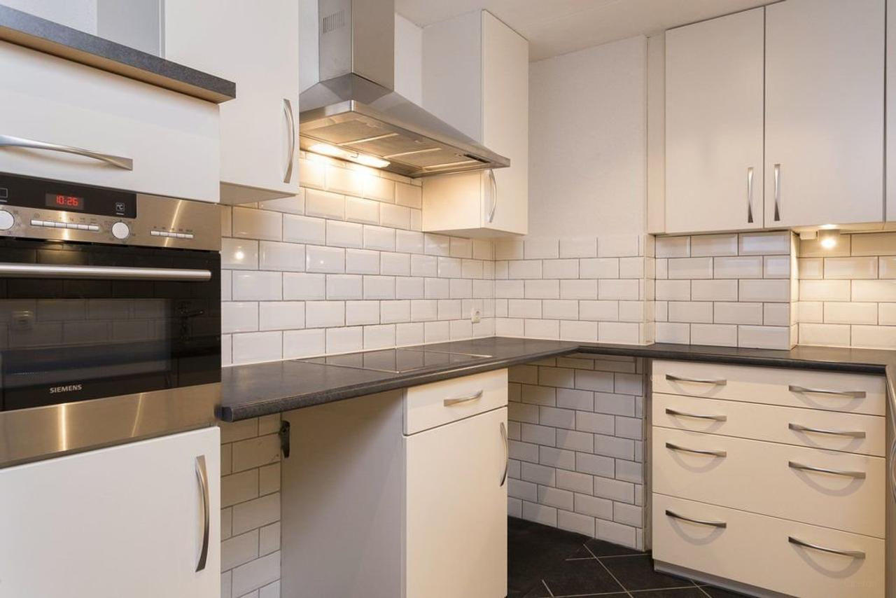 Furnished 1-Bedroom Apartment with Green Views - Image 2