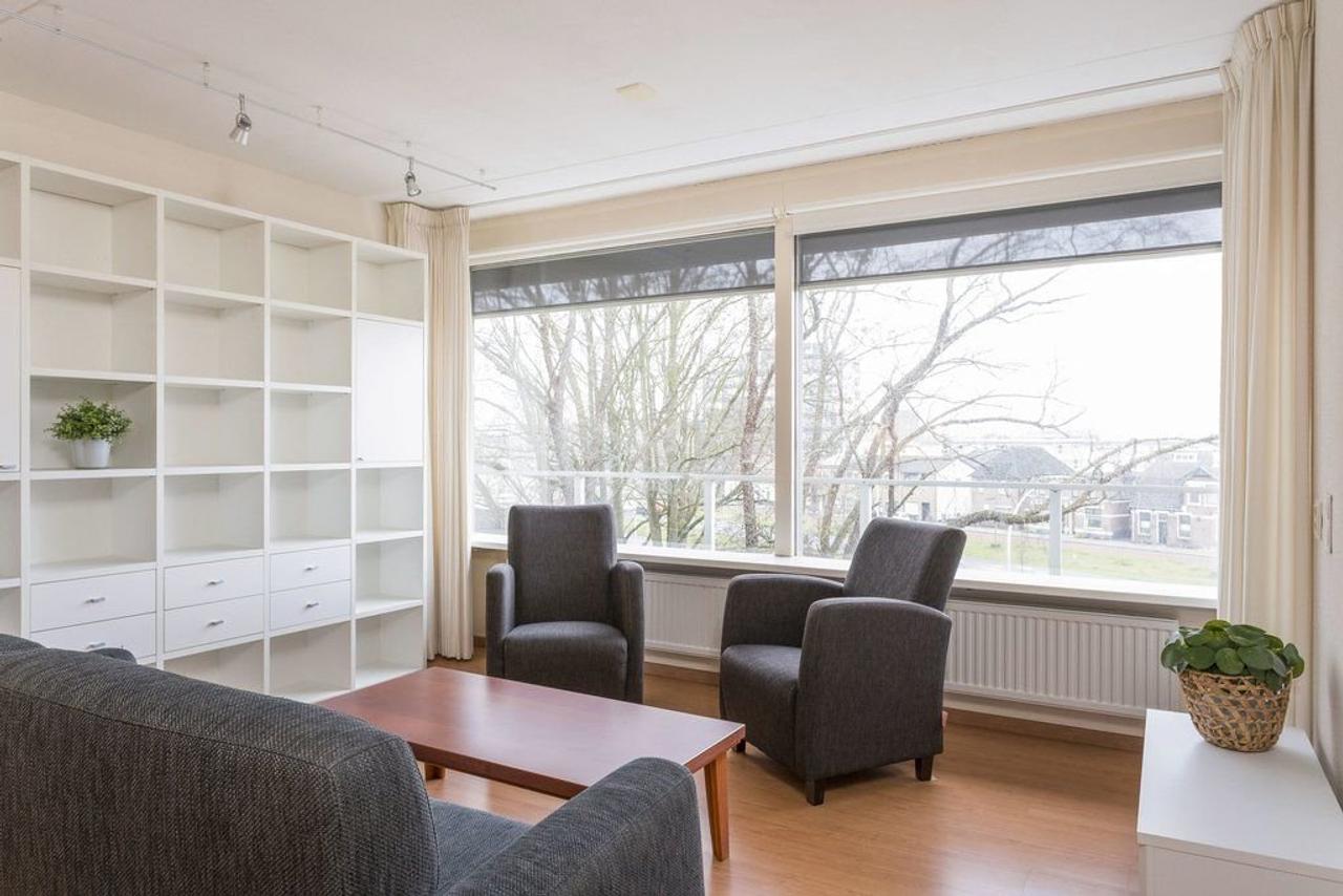 Furnished 1-Bedroom Apartment with Green Views - Image 3