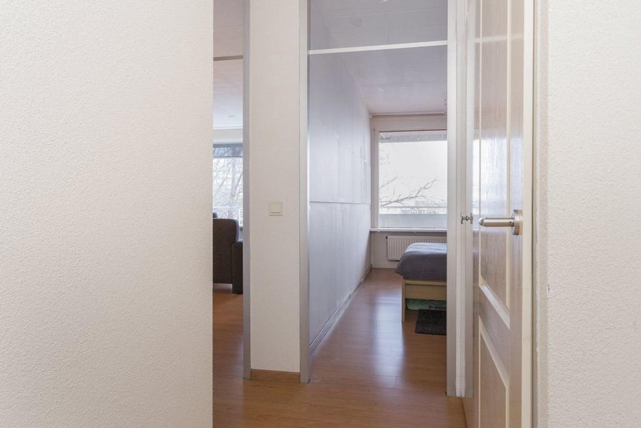 Furnished 1-Bedroom Apartment with Green Views - Image 9