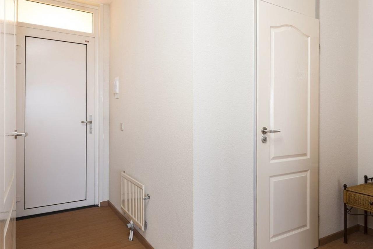 Furnished 1-Bedroom Apartment with Green Views - Image 14