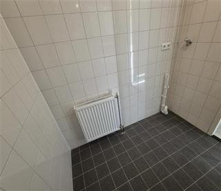 Gelijkvloers 3-kamerappartement met tuin - Afbeelding 6