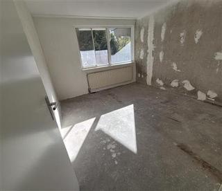 Gelijkvloers 3-kamerappartement met tuin - Afbeelding 8