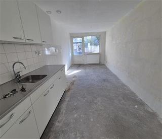 Gelijkvloers 3-kamerappartement met tuin - Afbeelding 12