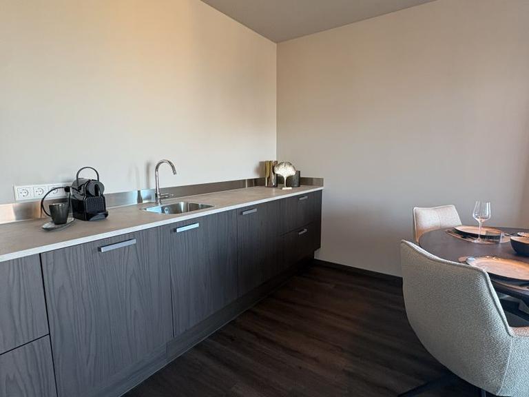 Furnished 1-Bedroom Apartment with Balcony - Image 8