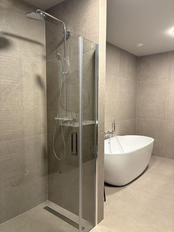 Furnished 1-Bedroom Apartment with Balcony - Image 11