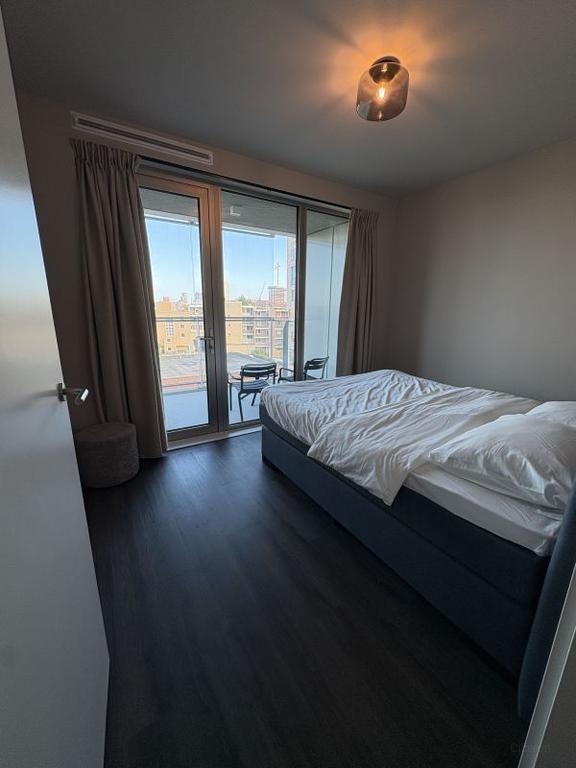 Furnished 1-Bedroom Apartment with Balcony - Image 16