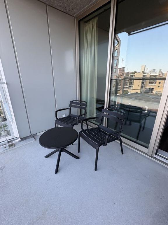 Furnished 1-Bedroom Apartment with Balcony - Image 18