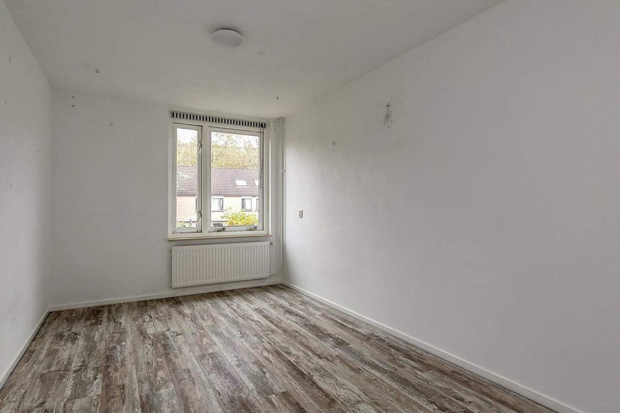 Eengezinswoning met 4 slaapkamers en tuin - Afbeelding 6