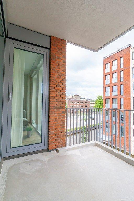 Furnished 1-Bedroom Apartment with Balcony - Image 15
