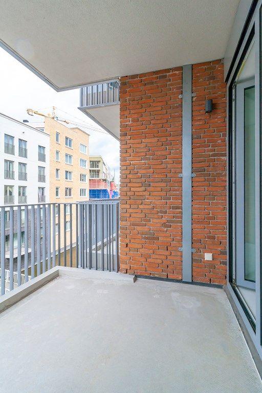 Furnished 1-Bedroom Apartment with Balcony - Image 16