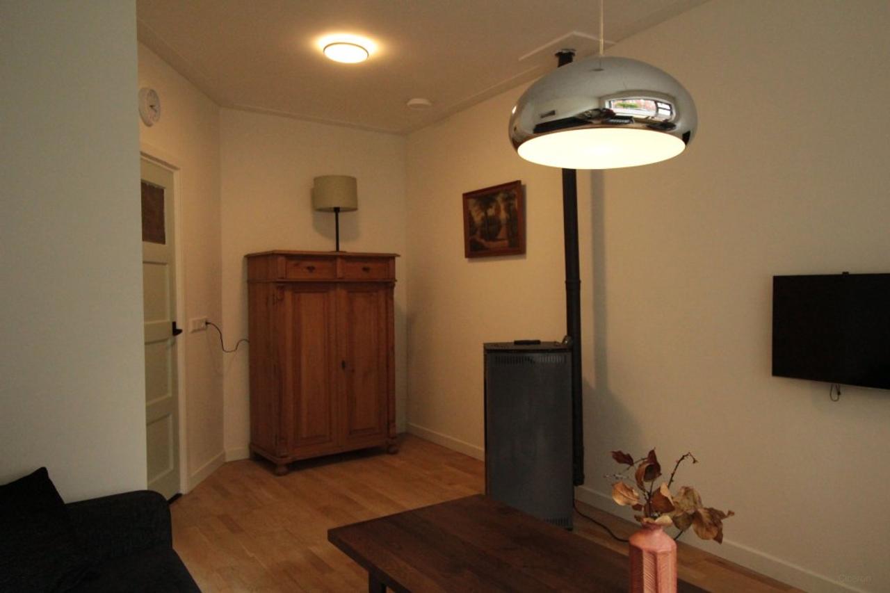 Gemeubileerde benedenwoning met tuin - Afbeelding 4