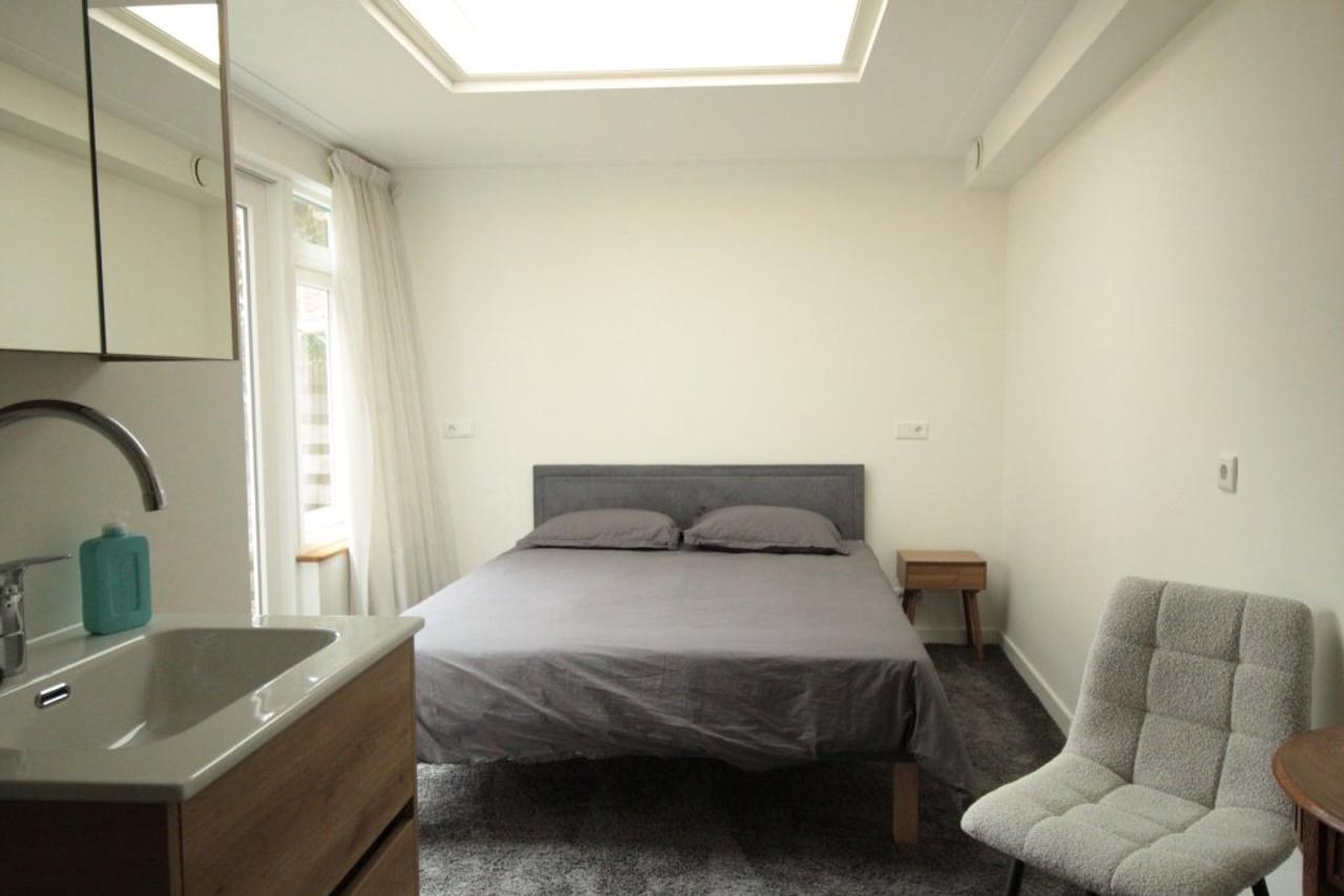 Gemeubileerde benedenwoning met tuin - Afbeelding 11