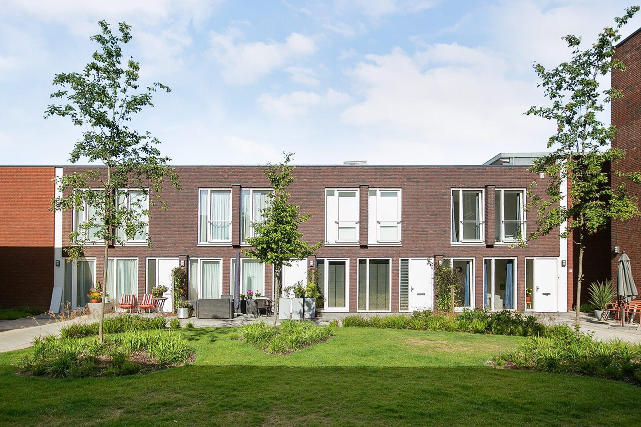 Woning met parkeerplek nabij Tilburg CS - Afbeelding 1