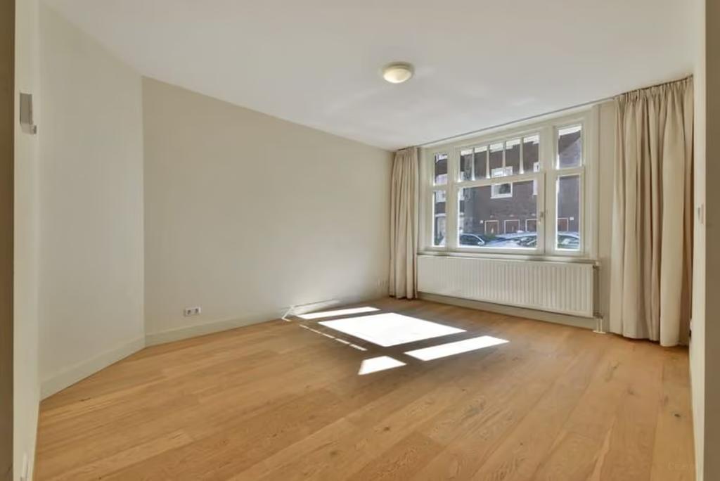 Furnished 2-Bedroom Apartment with Garden - Image 1