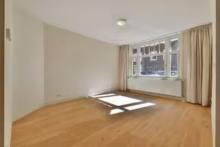 Furnished 2-Bedroom Apartment with Garden