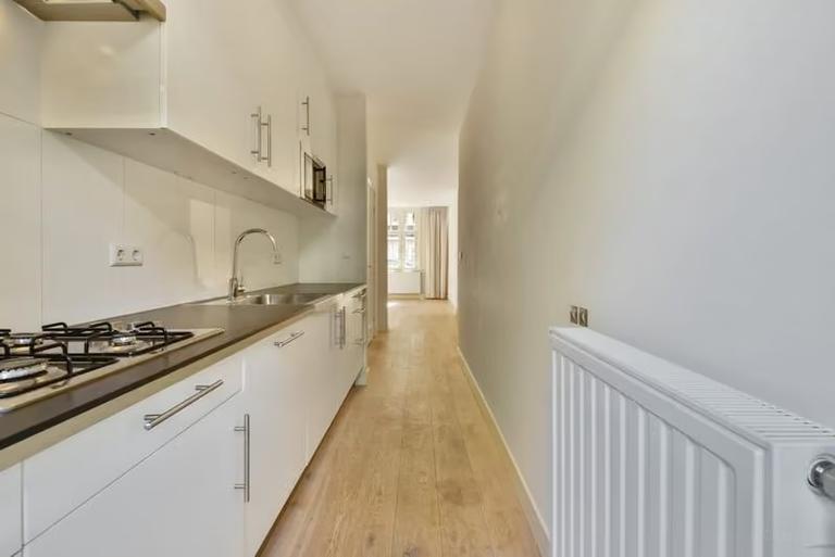 Furnished 2-Bedroom Apartment with Garden - Image 7