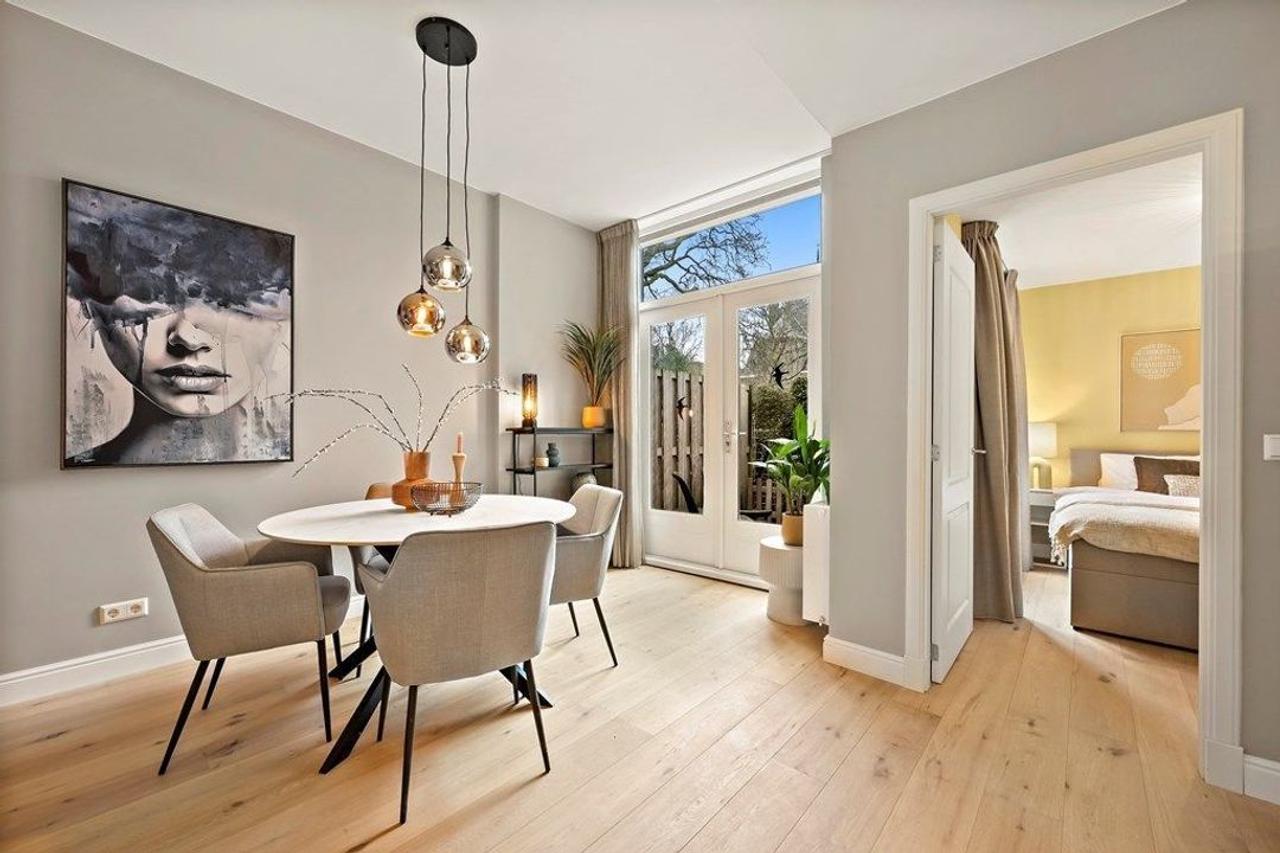 Furnished ground-floor apartment with garden - Image 1