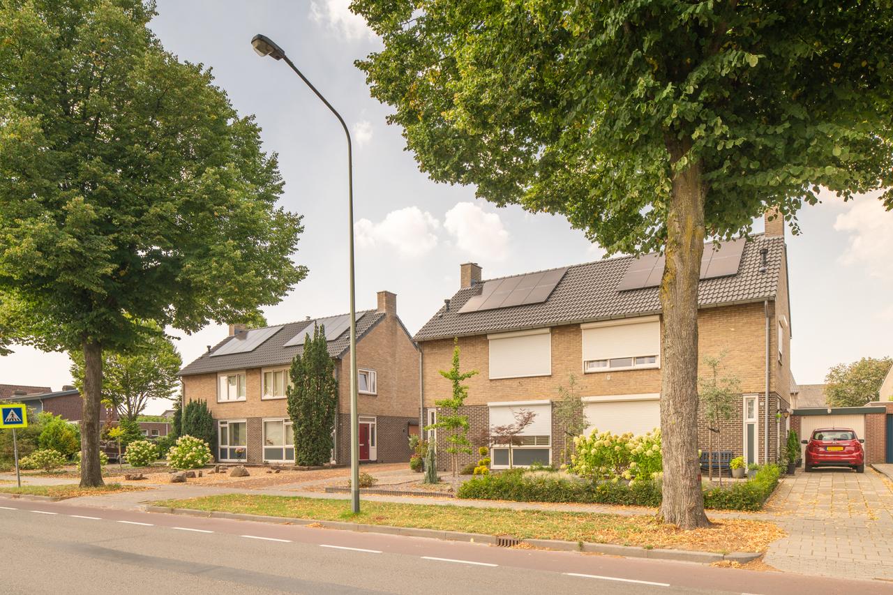 Tussenwoning met tuin, garage en label A - Afbeelding 1