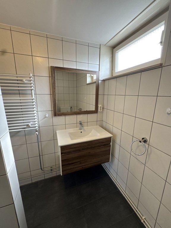 Hoekwoning met royale tuin in Enschede - Afbeelding 8
