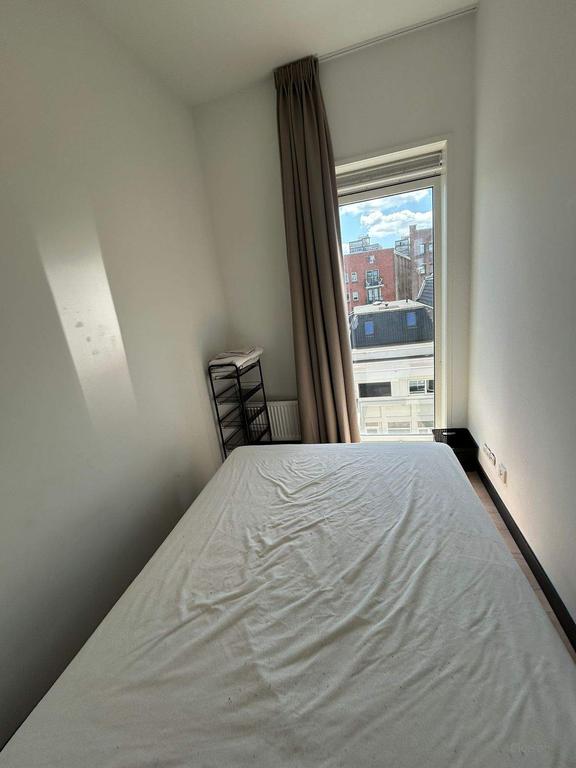 2-slaapkamerappartement bij de binnenstad - Afbeelding 9