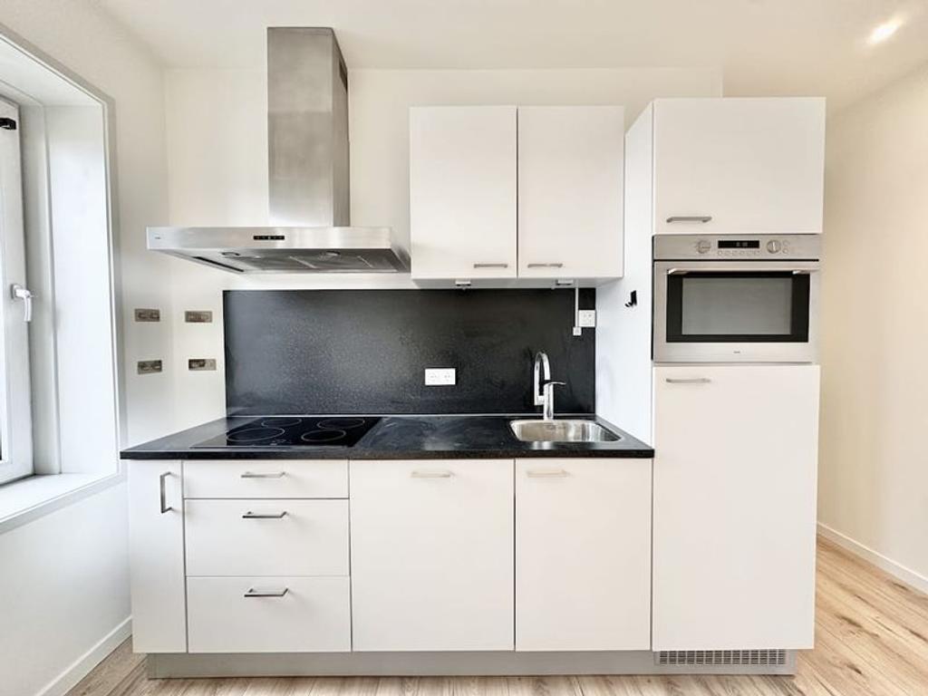 Furnished 1-Bedroom Apartment with Balcony - Image 3