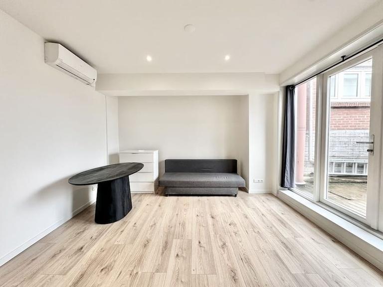 Furnished 1-Bedroom Apartment with Balcony - Image 4
