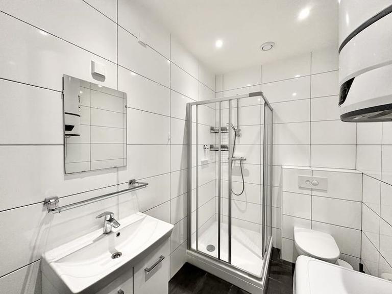 Furnished 1-Bedroom Apartment with Balcony - Image 13