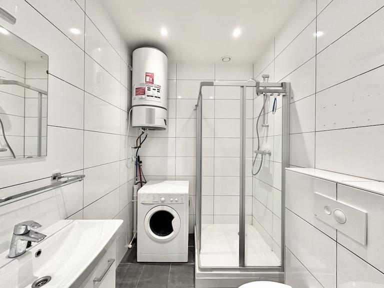 Furnished 1-Bedroom Apartment with Balcony - Image 17