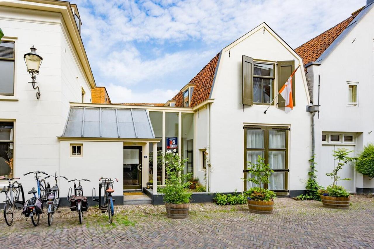 Historisch koetshuis met terras in Amersfoort - Afbeelding 1