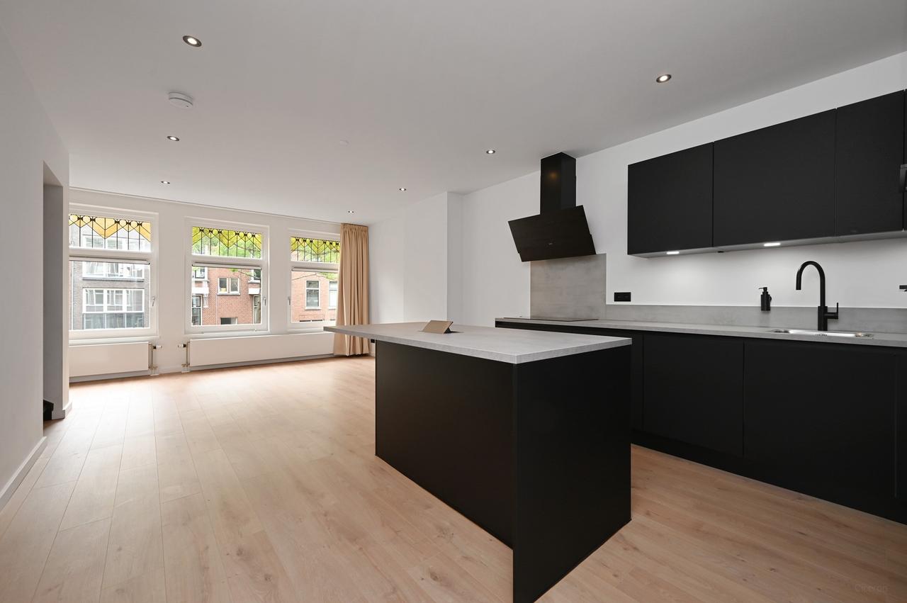 Dubbele bovenwoning met dakterras in Kralingen - Afbeelding 1