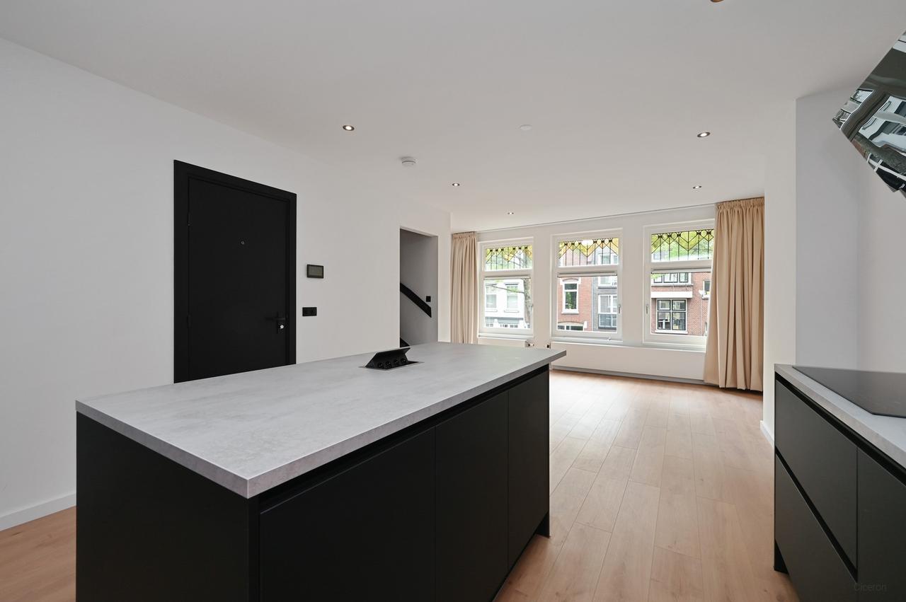 Dubbele bovenwoning met dakterras in Kralingen - Afbeelding 2