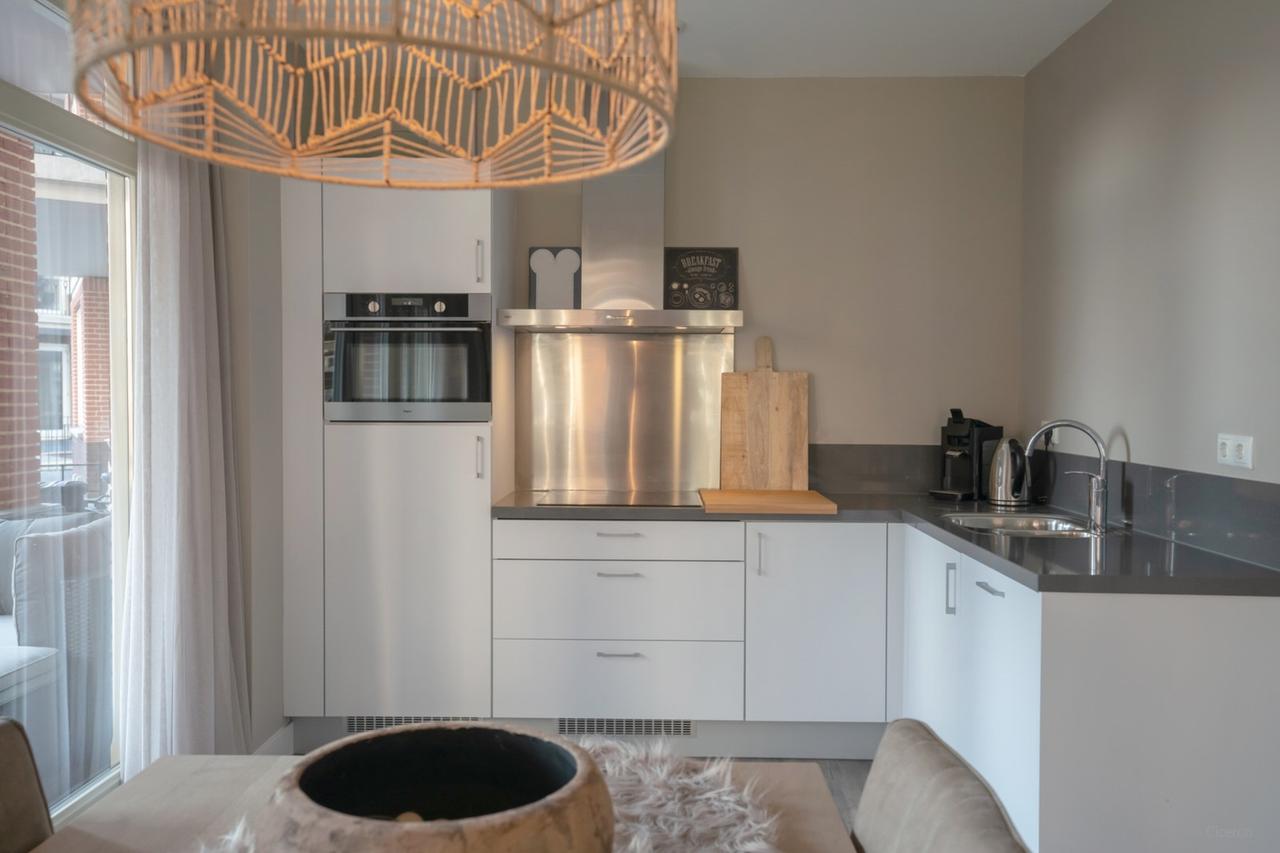 Gemeubileerd 55+ appartement met terras - Afbeelding 3