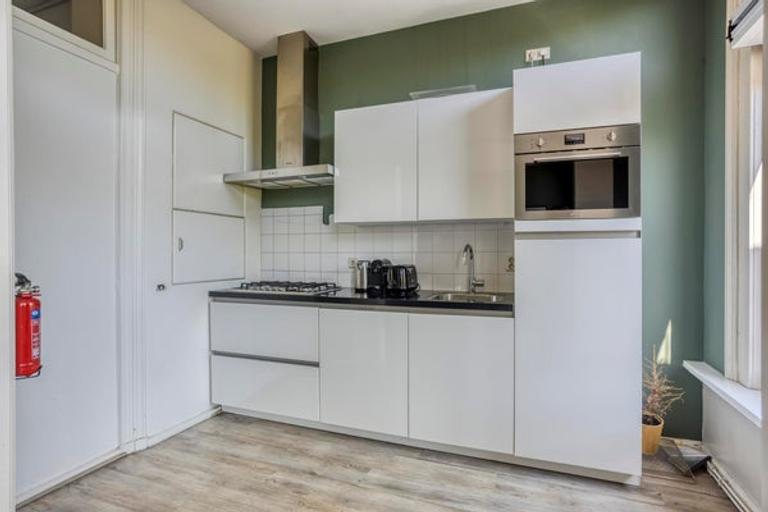 Gemeubileerd 2-slaapkamerappartement met tuin - Afbeelding 7