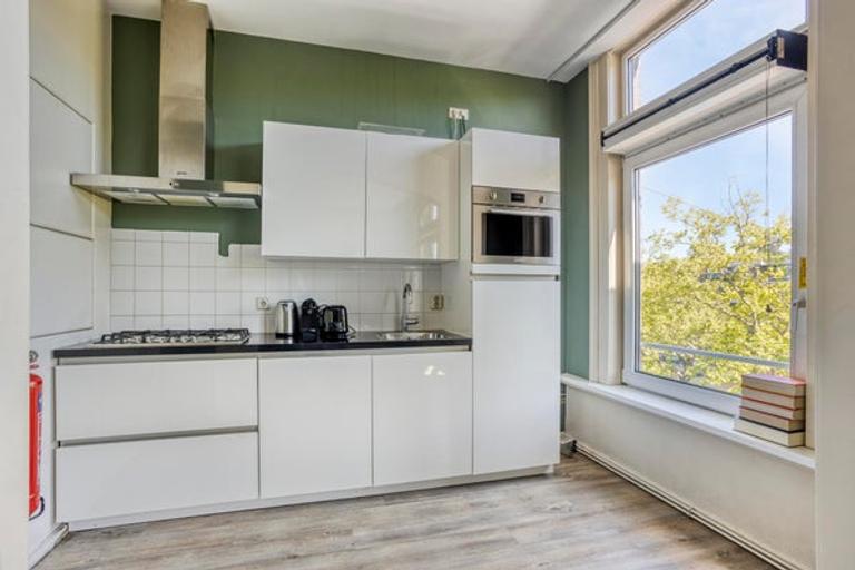 Gemeubileerd 2-slaapkamerappartement met tuin - Afbeelding 8