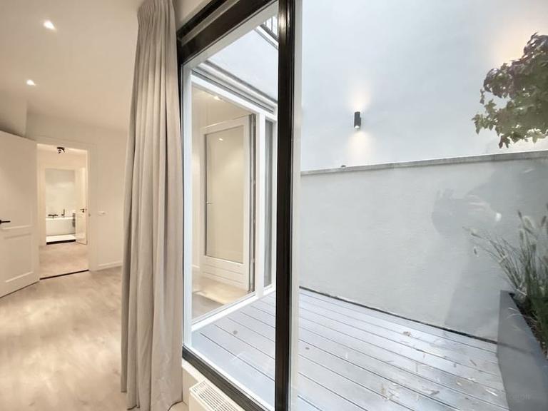 Gemeubileerd 3-kamerappartement met patio - Afbeelding 11
